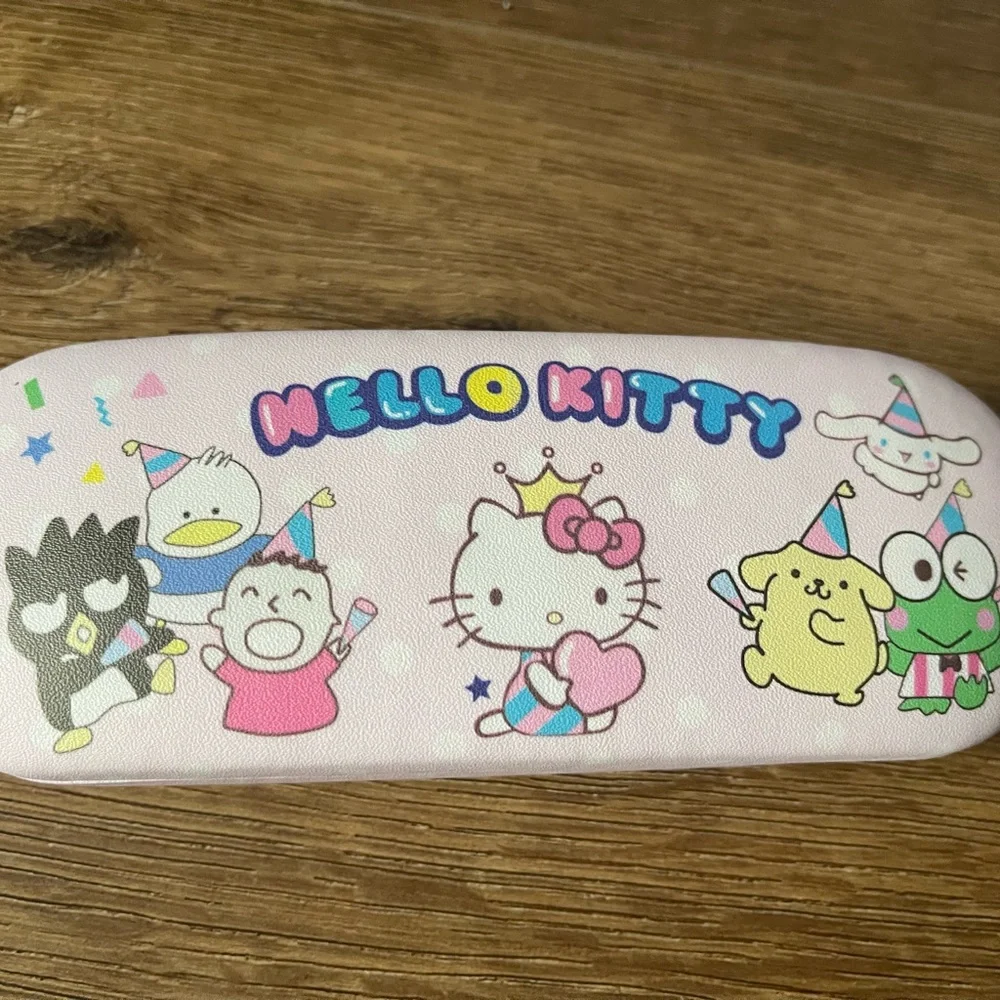 SANRIO-NWT Children’s Hello Kitty Sunglasses and Character Holder Set!